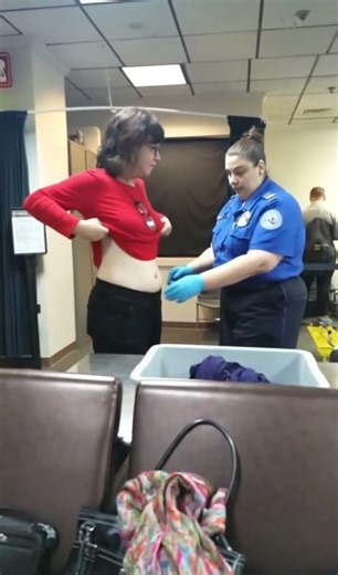 TSA officer asks woman to raise her shirt during a pat down #frisk #patdown #airport #tsa #police