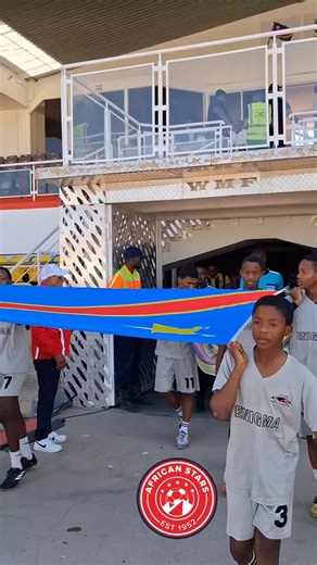 Team steping out fir kickoff and national anthems. | African Stars Soccer Club