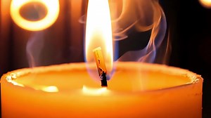 Download Close-Up of Burning Candle Flame. for free