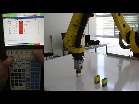 Programación a nivel básico del robot Fanuc M10-iA con entradas y salidas (RI/RO, wait, call).