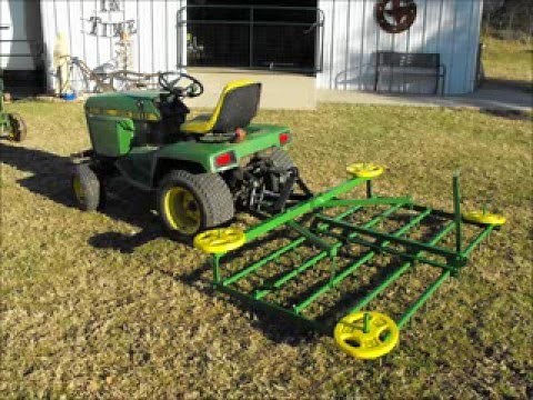 John Deere 332 with Homemade Harrow