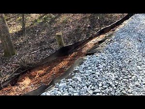 Developing our Homestead...Turning a hill side into a site for a metal carport.