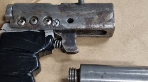 Police raid uncovers guns, meth