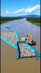 Step by step, cleaner rivers are possible. With new barrier technology and dedicated crews, more waste is being safely collected and removed every year. | Sanji Sanke