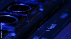 Camera sliding over old retro cassette music player buttons, finger pushing play at the end, great for musical themes intro, macro closeup