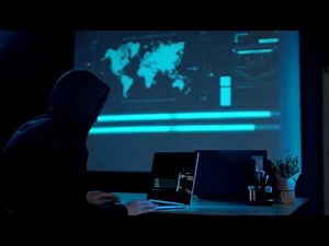 A Hacker With The Laptop in a Dark Room - Free Stock Video - (1080p)
