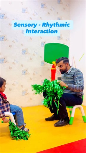 Dr. Vipul Vithal on Instagram: "Developing body awareness, rhythmicity and coordination of movements through sensory-rhythmic interaction under music. Tasks: 1. Stimulate perception through the rustling sound of pom poms. 2. Develop the ability to move in accordance with the musical rhythm. 3. Develop the coordination of hand motions. 4. Form an idea of body parts: arms, legs, shoulders. 5. Increase the child’s confidence in joint activity, through gentle tactile stimulation throughout the lengt