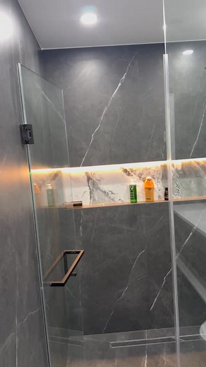 A beautiful bathroom transformation completed by AG Tiling and Renovation, featuring two of our premium large-format porcelain slabs. The clean installation, seamless edges, and elegant veining bring a modern and elevated finish to the entire space. 🛁 Featured Products: • Sky Mirror Porcelain Glazed Slab 🏷️ SKU: MNL48961042-FS • Armani Grey Porcelain Glazed Slab 🏷️ SKU: MNL361081044-FS These slabs add depth, movement, and a refined look — perfect for high-end bathroom projects. Visit us at on