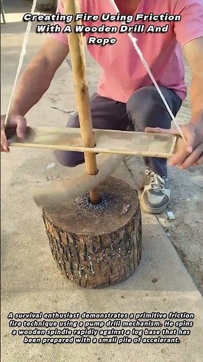 Creating Fire Using Friction With A Wooden Drill And Rope