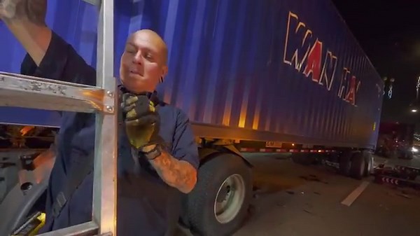 Horrific semi crash destroys container on freeway