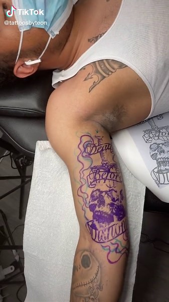 Custom Inner Bicep Skull Tattoo Design