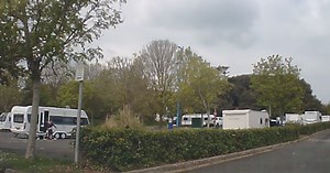 Huge travellers camp at beach grows to 22 different vehicles