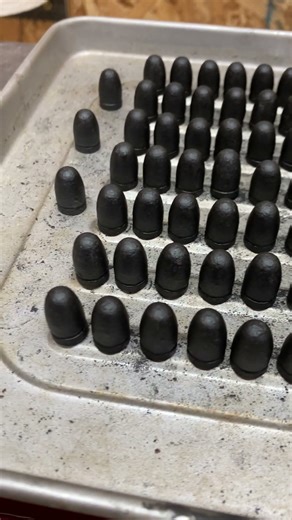 Freshly powder coated cast 130 grain 9mm bullets #casting #castbullets #powdercoat #powdercoating