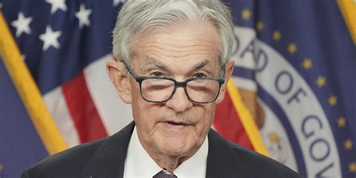 Fed Warns of Rising Economic Risks as It Leaves Rates Steady