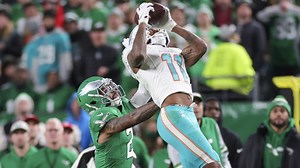 Ced Wilson climbs the ladder for 30-yard sideline grab