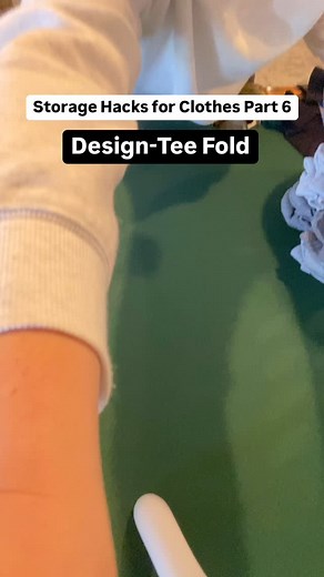 Level up your T-shirt game with my Design-Tee Fold! 😉⤵️ First of all, I’ve been folding t-shirts this way for the last 5 years and it’s easy to maintain. 🙌 Even the hubby loves it because it saves time looking for what he wants to wear. 👏 Here’s exactly how to do this fold: 1️⃣ Lay your T-shirt design down. 2️⃣ Fold in half lengthwise, matching up the sleeves. 3️⃣ Fold the sleeves inward. 4️⃣ Bring the bottom hem to meet the top (folding in half). 5️⃣ One more fold, this time with the design
