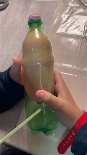 Inflating the balloon inside the bottle. High pressure to low pressure principle.