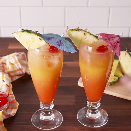 You're always on vacation when you have a Bahama Mama in hand. Full recipe: http://dlsh.it/dMqFy8R | Delish