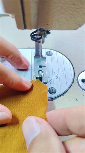 sewing the edge of the fabric using a special foot #sewing