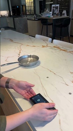 How does an invisible hob like the Novy Undercover work, and is it safe?