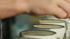 Man stirs coffee slowly ensuring aroma released and reaches sense. Man confident sensory evaluation provides valuable feedback on quality