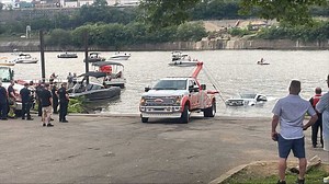 Pickup truck slips into the Mon River