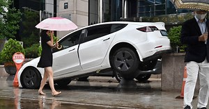 Heavy rain in South Korean capital kills 8 and turns roads to rivers