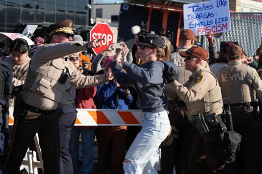 4 cops hurt in clash with protesters near Chicago area ICE facility