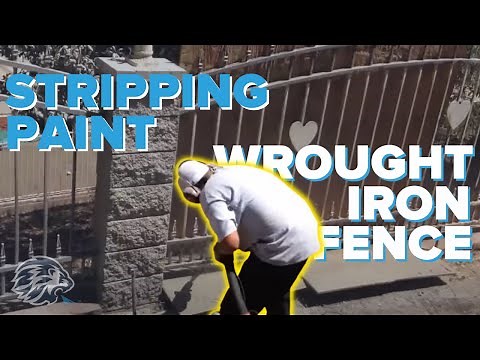 Dustless blasting a wrought iron fence to strip paint