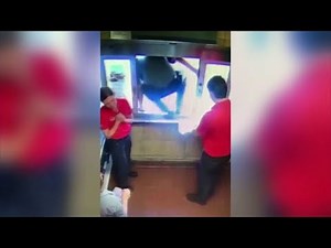 Fast food hero jumps thru drive-thru to save child