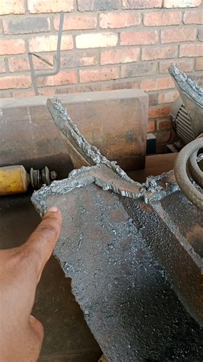 CLEAN CUT USING CUTTING TORCH IN MECHANICAL WORKSHOP PRIOR WELDING IN WORKSHOP