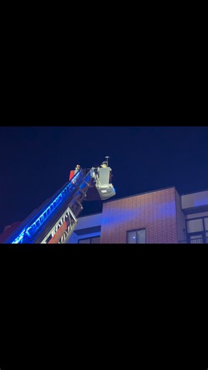 A tower ladder is put into operation in downtown Springfield, Mo. at a building fire call at 305 S. Campbell Springfield, MO Fire Department | RNN News