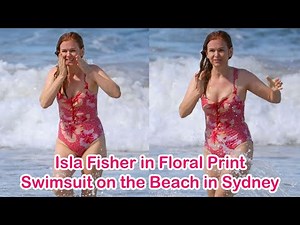Isla Fisher in Floral Print Swimsuit on the Beach in Sydney
