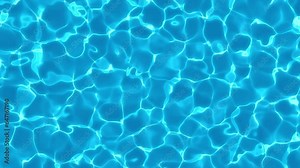 Water surface in a swimming pool, with reflections of sunlight and caustics