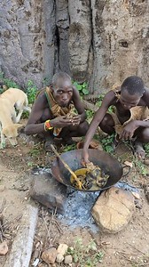 Hadzabe Tribe bushmen family spend quality time cooking and eating bush bbq soup daily in their simple traditional lifestyle in the nature 🥰 #fblifestyle | Hadzabe Tribe Life
