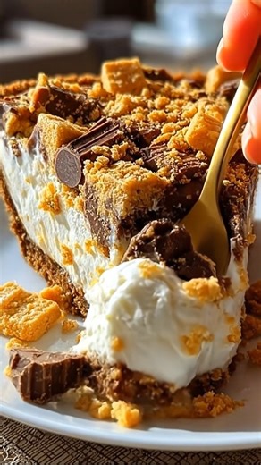 Butterfinger Pie *There are some desserts that instantly feel like a family favorite, and this Butterfinger Pie is one of those sweet treats. Cool, creamy, and filled with that unmistakable peanut-butter crunch, it’s the kind of simple indulgence that shows up at potlucks, holidays, and Sunday dinners—and always disappears fast.* What You'll Need (1½ cups) crushed graham crackers (½ cup) butter, melted (8 oz) cream cheese, softened (¼ cup) powdered sugar (1 teaspoon) vanilla extract (1 cup) heav