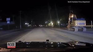 A high-speed chase, this was not, but that didn't stop the driver from trying. The North Charleston Police Department in South Carolina says it responded to an alarm. When they arrived at the location, they noticed property damage and this excavator creeping away from the scene. Officers attempted to make a traffic stop, but the excavator kept on going, although they never lost sight of it. #carchase #police #charleston #southcarolina | Inside Edition