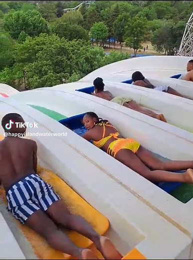 Rain down at the Rainbow Slide🌈