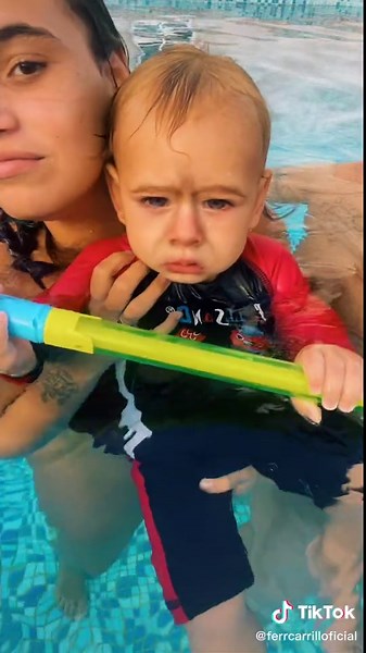 Family Fun in the Swimming Pool with Baby