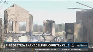 Members assess damage after country club fire