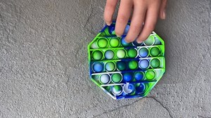 Watch Playing the Pop Push It Bubble Fidget on Amazon Live
