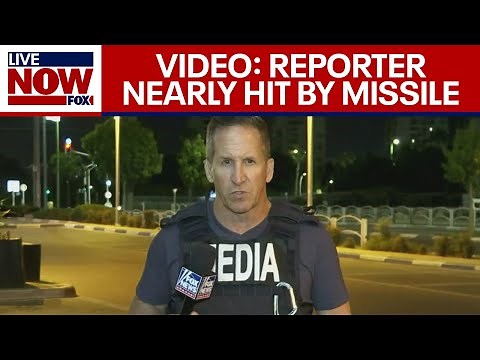 Israel War: Missile flies over reporter's head| LiveNOW from FOX