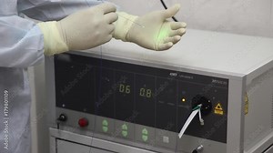 Close-up. The doctor demonstrates the device for laser destruction of kidney stones