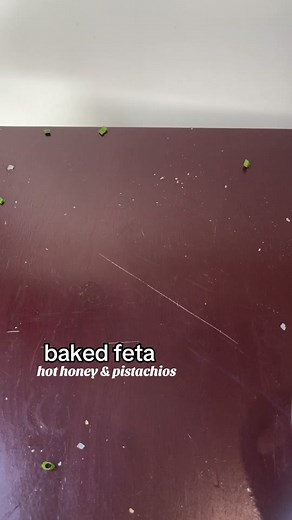 BAKED FETA HOT HONEY & PISTACHIOS 🥰 * 8oz feta block, broken up into chunks * 2oz cream cheese, softened * 2 tbsp hot honey * 2 tbsp olive oil * 2 tbsp fresh chopped chives Topping: * 3 tbsp hot honey * 1/4 cup roasted salted pistachios, roughly chopped * 2 tbsp chopped chives * flakey sea salt * In a food processor, blend together feta, cream cheese, hot honey, olive oil, and chives until well combined. Scrape down sides as needed. * Pour into small baking dish. Bake for 12 minutes. * Top with