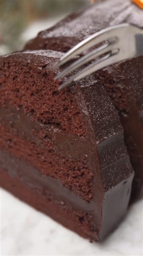 Our Original All Chocolate Log Cake is the quintessential Singapore chocolate log cake boasting soft cake with a bit of bounce, luscious dark chocolate fudge not too sweet with its distinctive roasted aftertaste. Enjoy gifting these famous cakes that have enriched Christmas for 27 years! 🍫 Order now via link in bio - Early bird Christmas prices end on 30 November. #chocolatelogcake #christmaslog #christmas #singaporecakes #giftcake #awfullychocolate | Awfully Chocolate Singapore