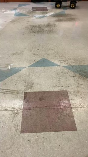 Stripping old worn wax from vct tile floor