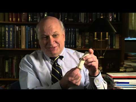 How does the Dacron graft replace the aorta?