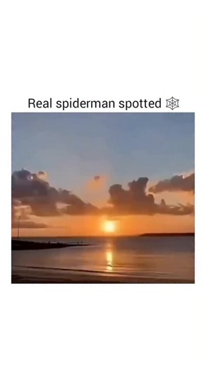 @gearheadgiggle on Instagram: "The video opens with a young man in a black hoodie standing before a blue wall. At 00:10, he lets out a soft "Oof!" as he pulls his hood over his head, then dons a black face mask. He subsequently places a red Spider-Man mask over the face mask, transforming his appearance. The scene cuts to a security guard in a blue uniform, also wearing a face mask, who mirrors the young man’s actions by putting on a Spider-Man mask over his own. After the young man walks away, 