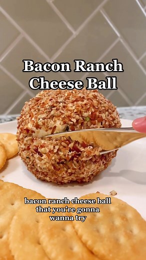 Bacon Ranch Cheese Ball: 8 oz cream cheese, 2 Tbsp sour cream, 1 Tbsp ranch seasoning, 4 oz thinly shredded sharp cheddar cheese, 1/3 cup chopped bacon bits, 1/4 cup chopped green onions, 2 oz chopped pecans for coating #baconranchcheeseball #cheese #cheeseballs #cheeseballrecipe #recipe #foodtok #foodies #easyappetizers #easyrecipe #recipevideo