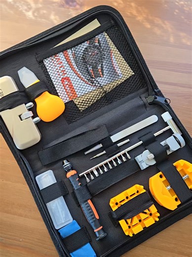 All-in-one watch repair tool kit for opening watch backs, replacing batteries, and resizing bands. Includes case opener, link remover, spring bar tool, and storage pouch. #menwatch #watchrepairkit #watchtoolset #batteryreplacement #watchbandadjustment